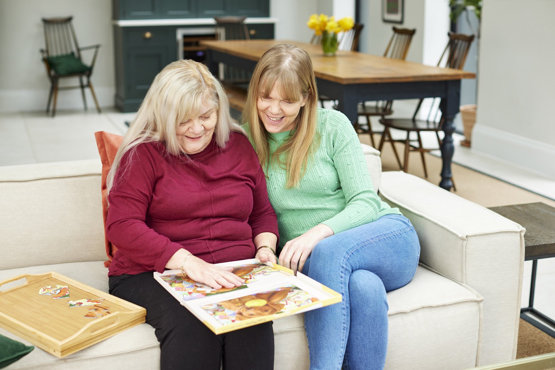 Jigsaw puzzles are a great nursing home activity to engage residents.