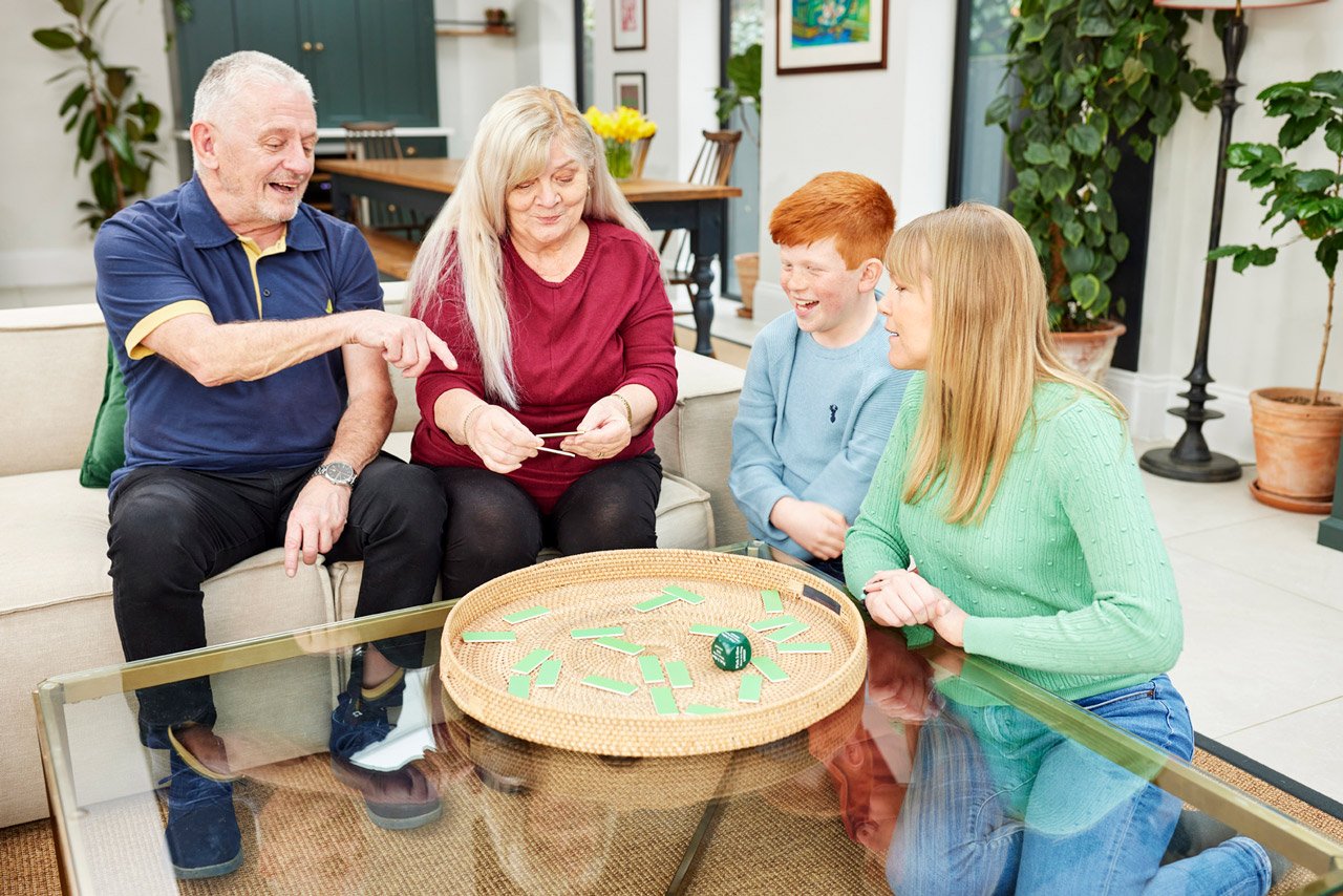 A family playing the hobbies conversation game.