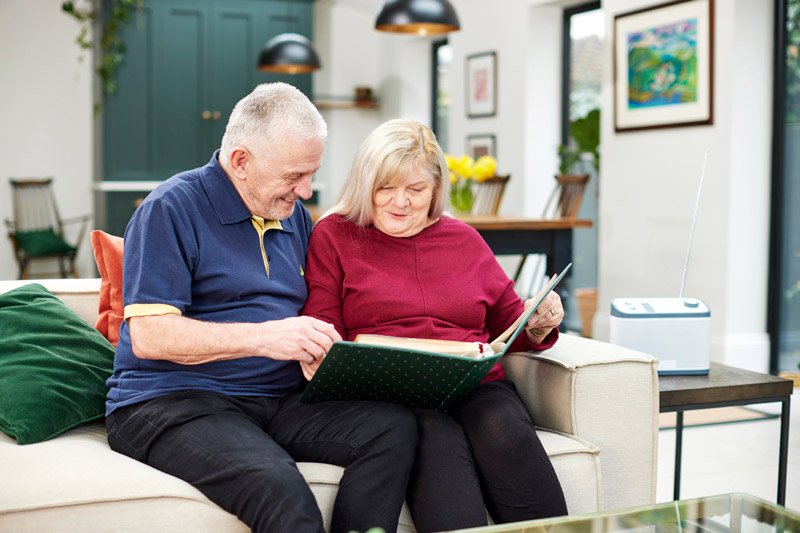 Reminiscing through photography is a nostalgic activity to do with residents in a care home.