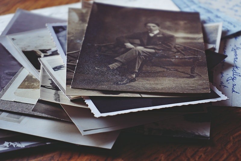 Old photographs in a pile